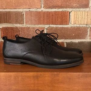 Black leather lace up shoes